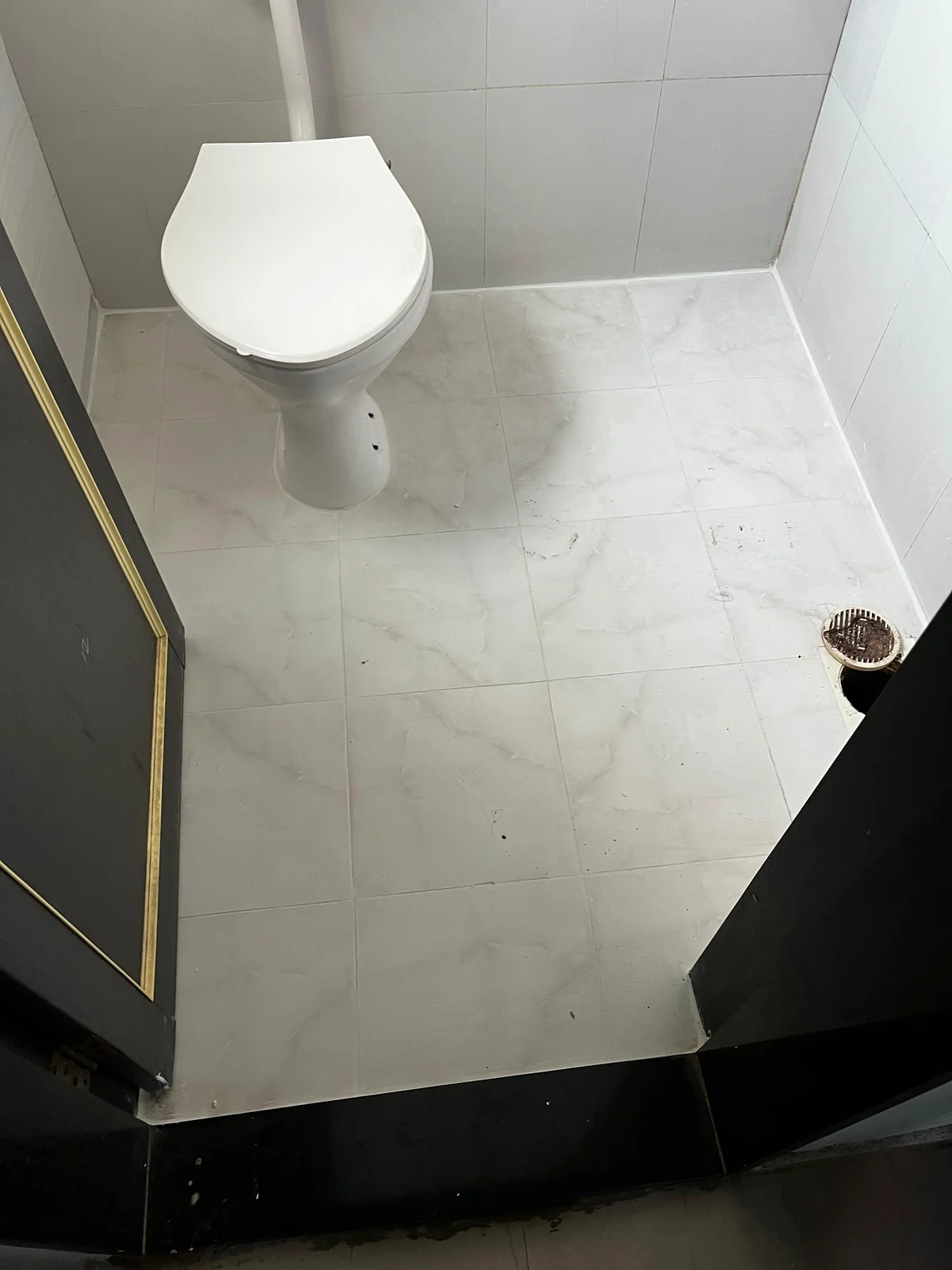 Bathroom waterproofing solution with zero tile breaking