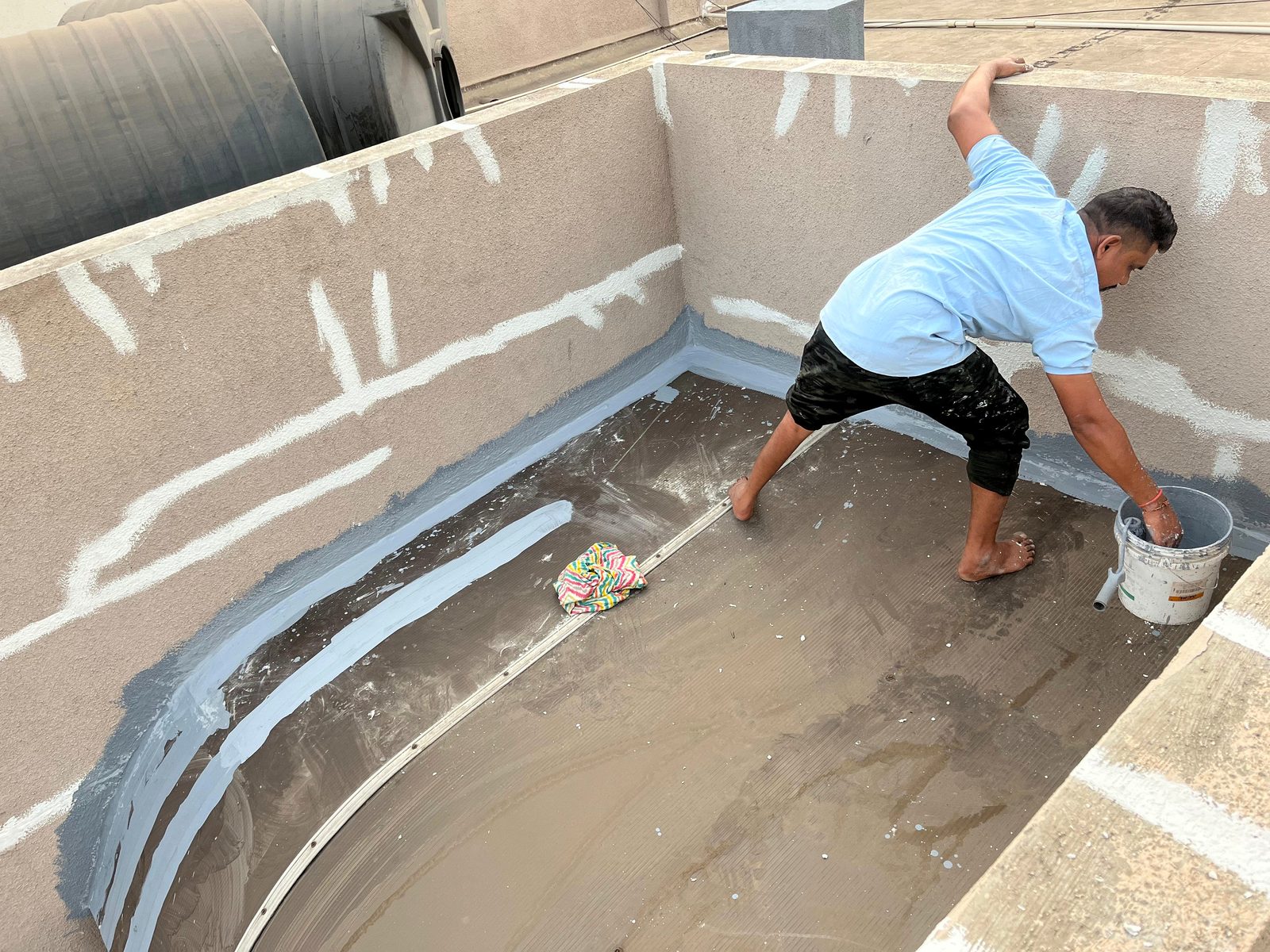 Terrace parapet corner fiber band reinforcement in Pune