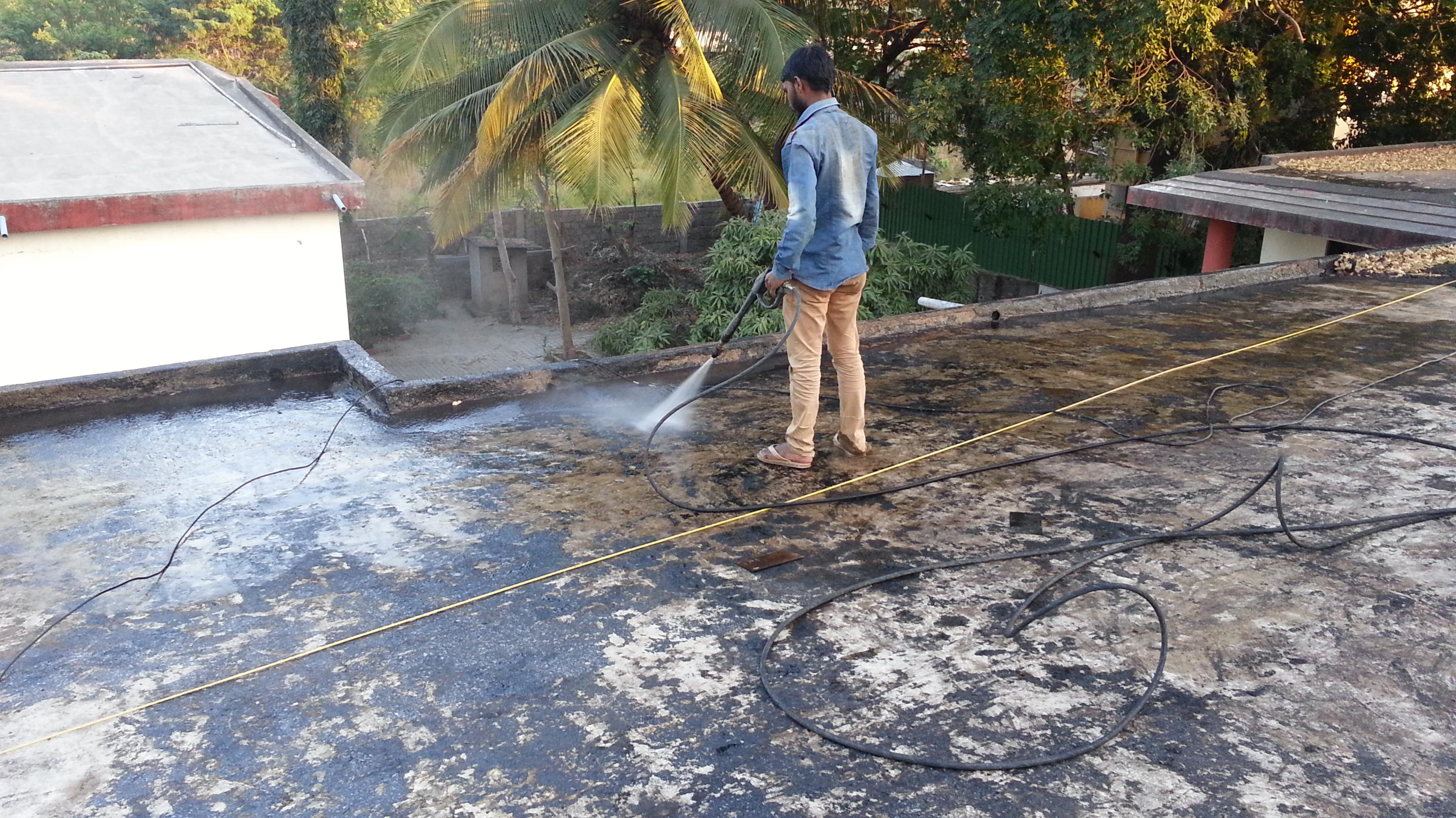 Terrace high-pressure jet cleaning and surface preparation in Magarpatta City Pune